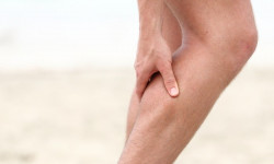 Причины и лечение ноющей боли в ногах